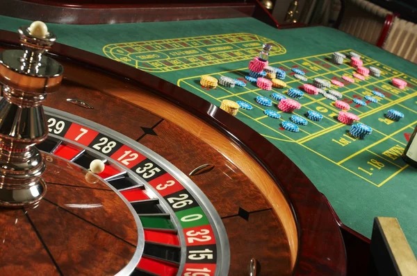 Monopoly Live game interface with physical wheel and board shown in real time